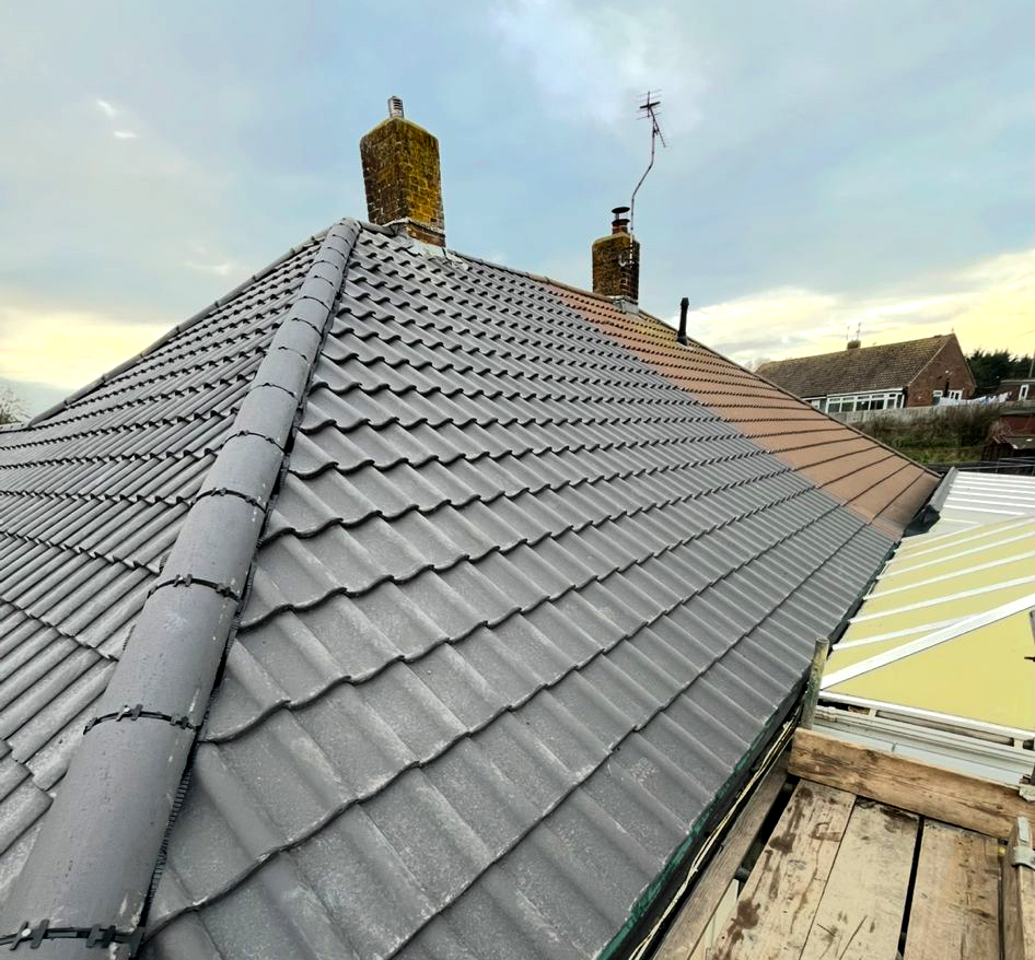 New clay tiled roof with dry ridge system