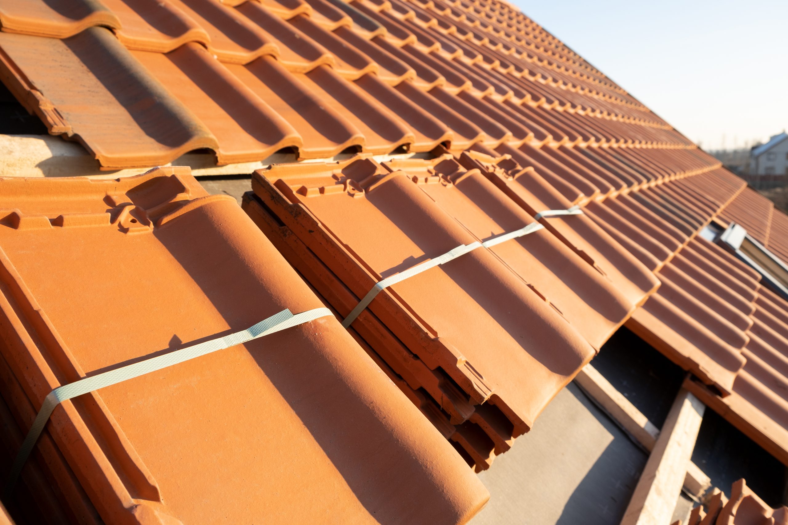 Stack of yellow tiles on roof